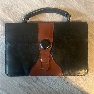 Elegant Black and Brown Leather Briefcase with Structured Design